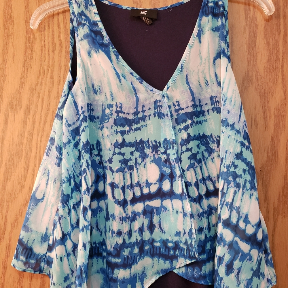 Beautiful navy blue sleeveless blouse with blue and white chiffon "overlay".